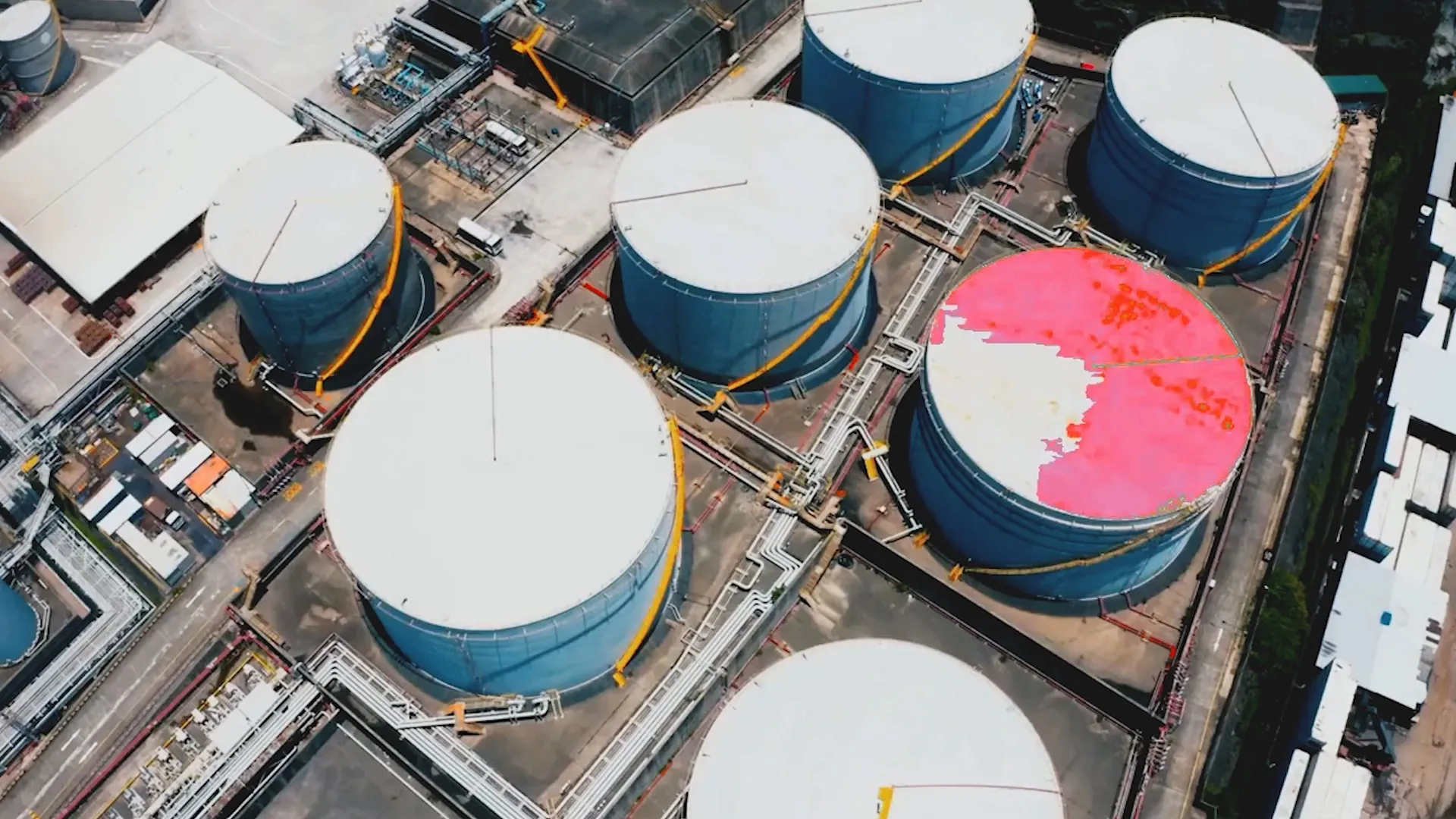 AI infrastructure inspection using drones to detect corrosion, cracks, and surface defects on large industrial storage tanks, ensuring safety, reliability, and efficient maintenance