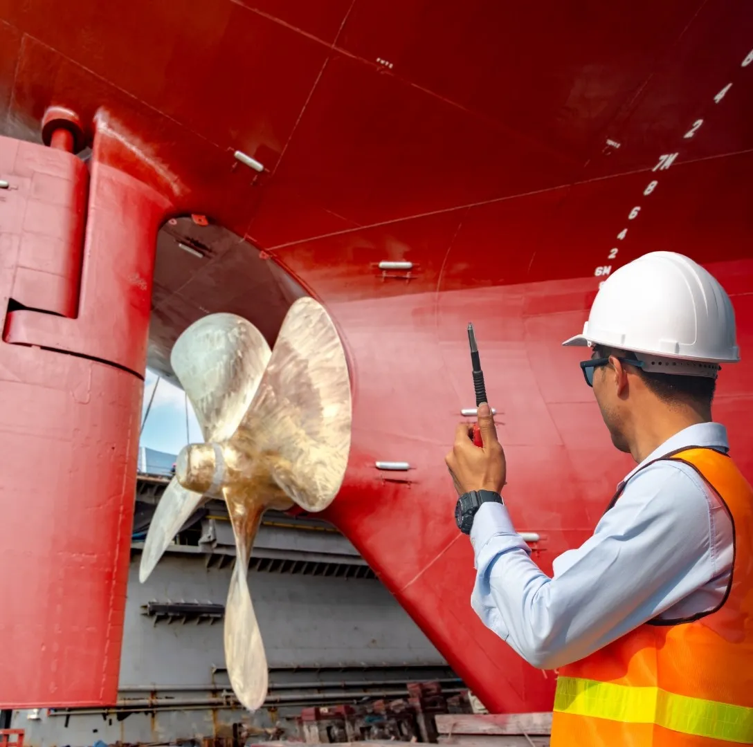 AI-powered drone and underwater ROV inspecting ship hull for cracks, corrosion, and biofouling using machine vision technology