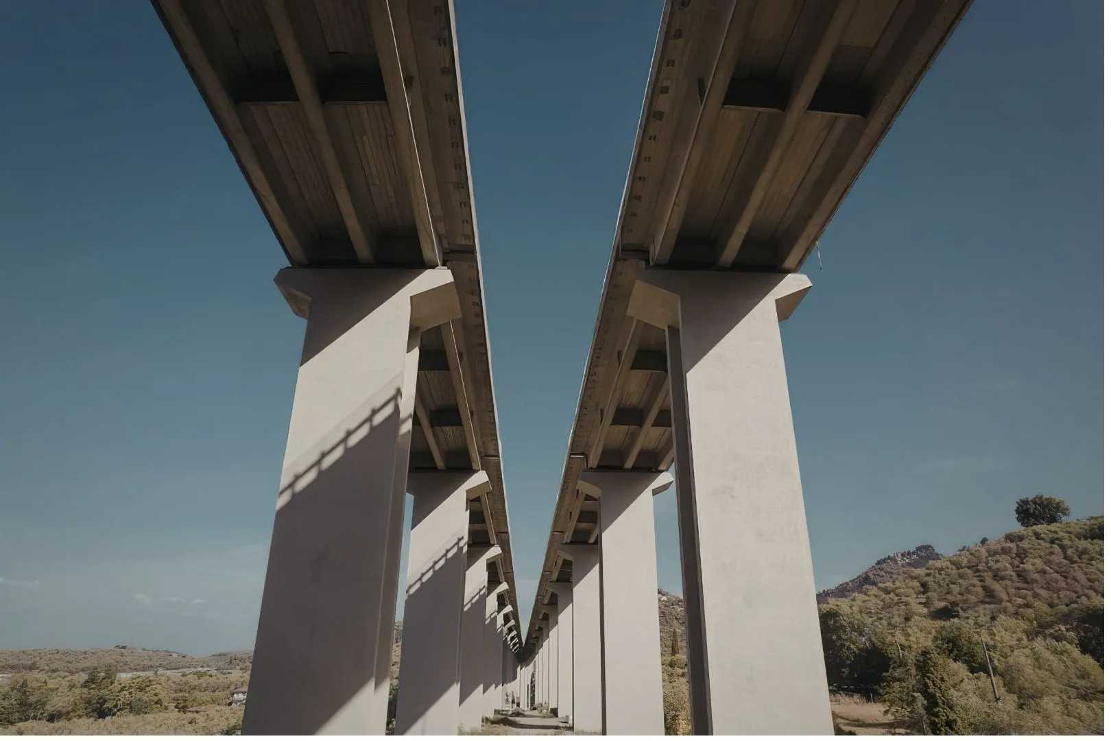 AI monitoring of bridges and civil infrastructure tracking cracks, concrete deterioration, and structural movement.